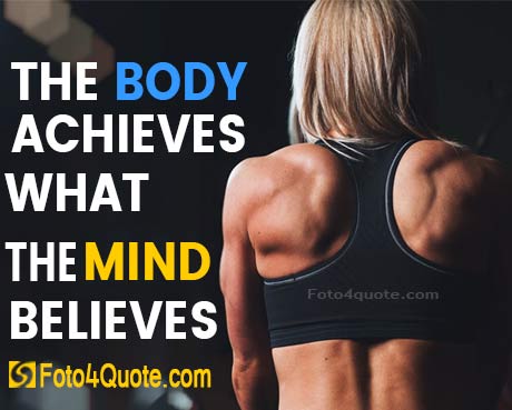 Sexy strong muscular woman in the gym working out with quotes about health and fitness to inspire you to improve your life - image 2